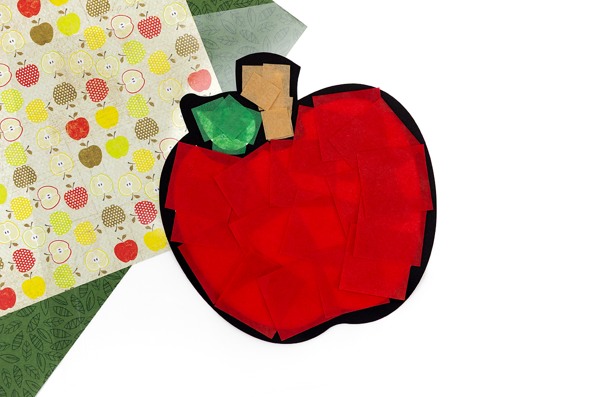 Tissue paper squares on apple template.