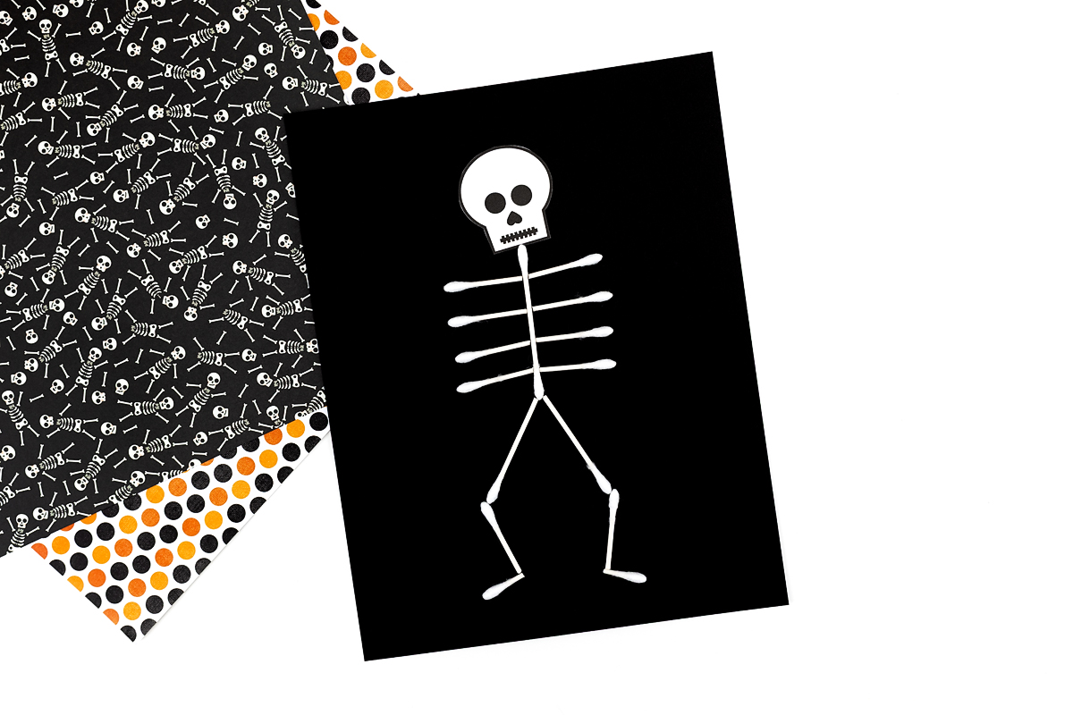 Cotton swab skeleton with ribs and legs.