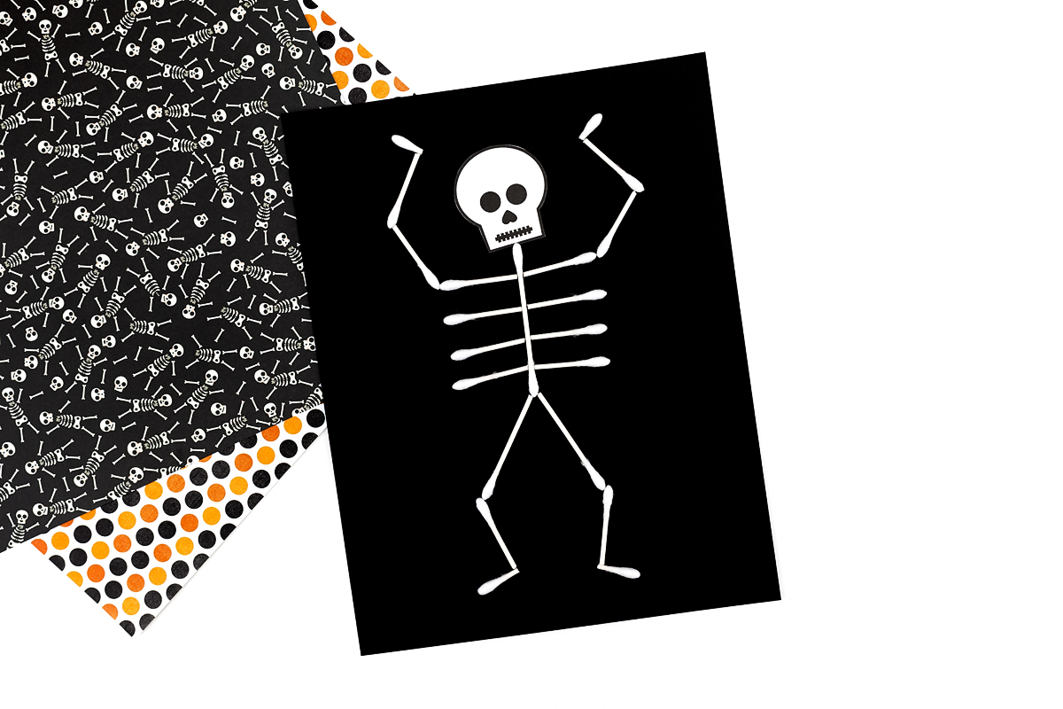 Finished cotton swab skeleton craft for kids.