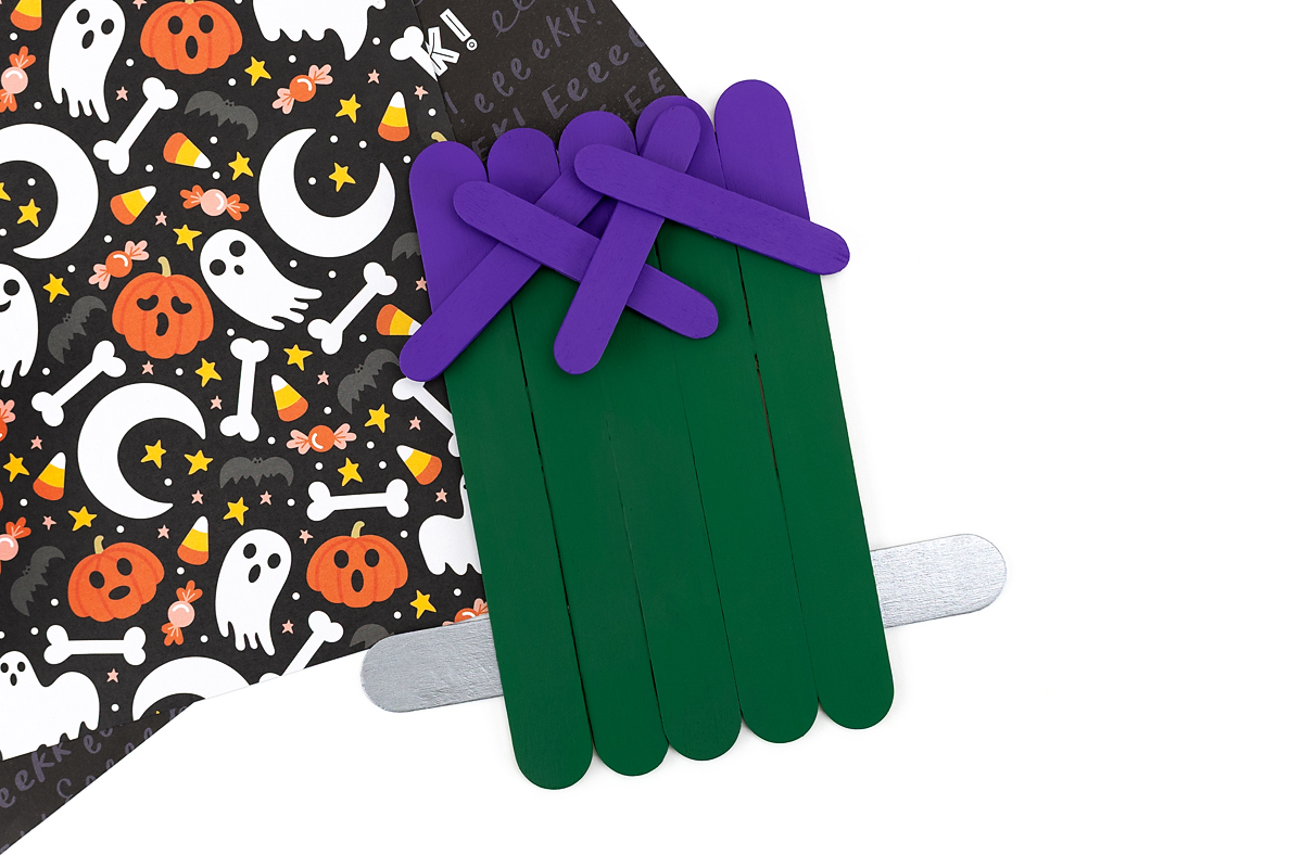 Hair and bolts added to the popsicle stick Frankenstein craft.