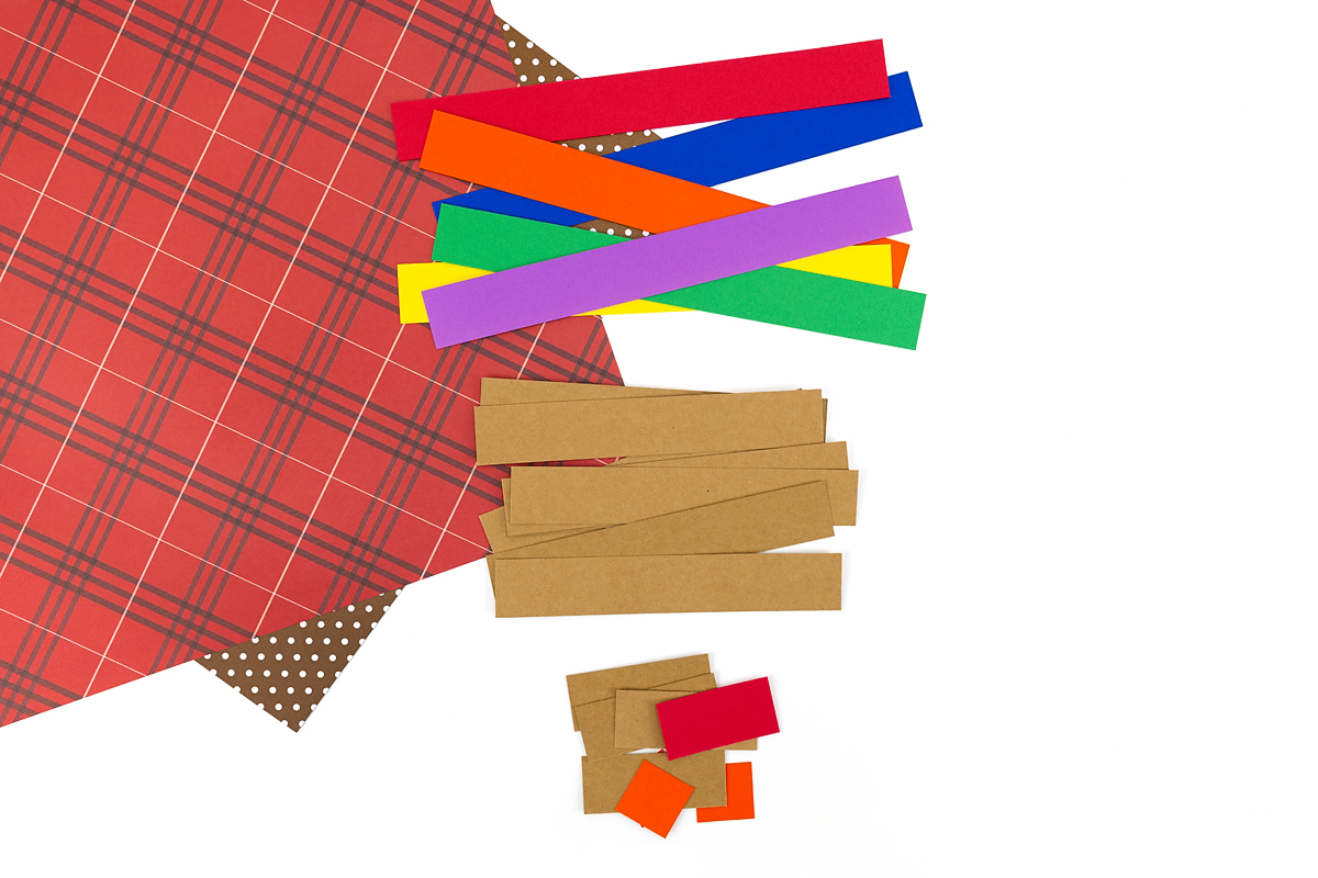 Pile of paper strips needed for turkey craft. 