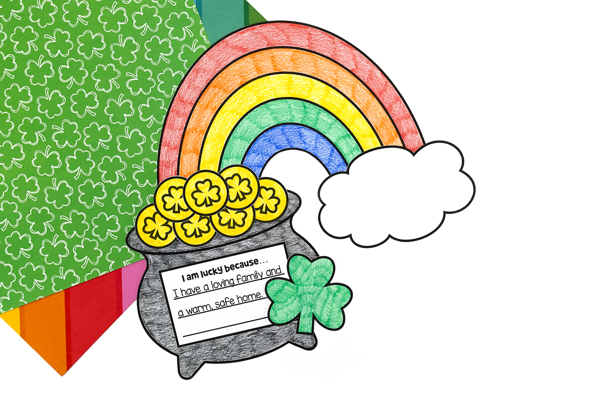 Close-up of Pot of Gold Craft with completed writing prompt showing child’s response to I am lucky because…