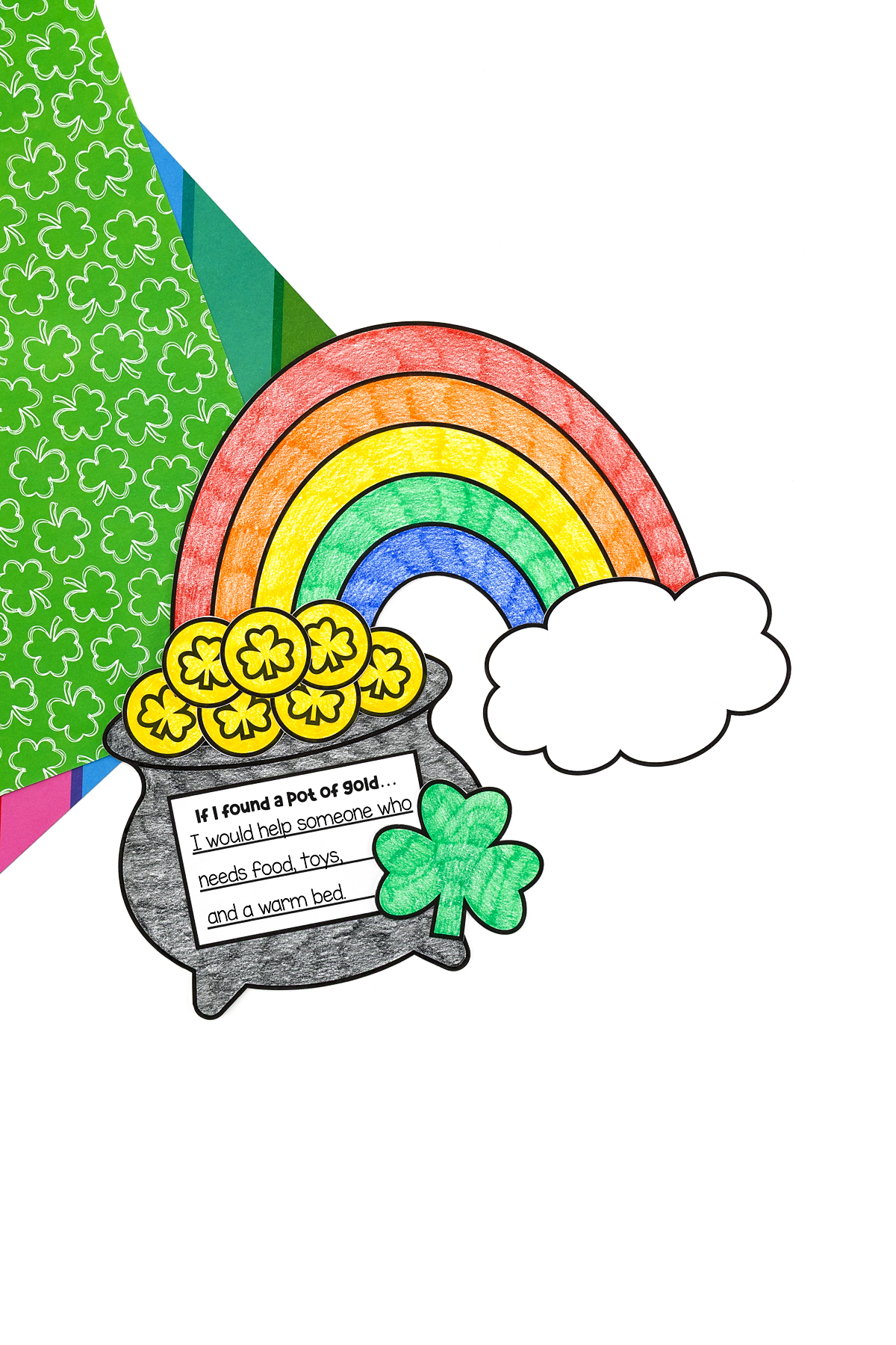 Completed Pot of Gold Craft with rainbow, gold coins, shamrock, and writing prompt for St. Patrick’s Day.
