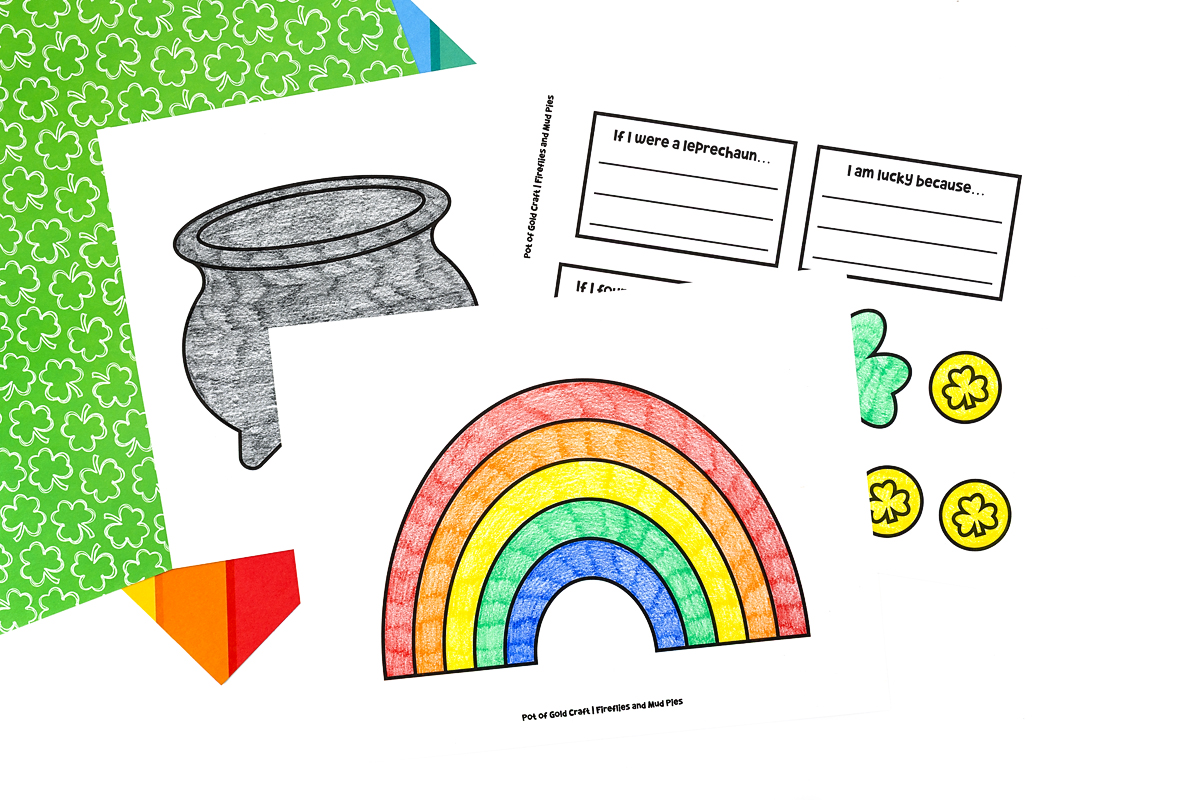 Coloring rainbow, pot, coins, shamrock, and cloud for St. Patrick’s Day Pot of Gold Craft.