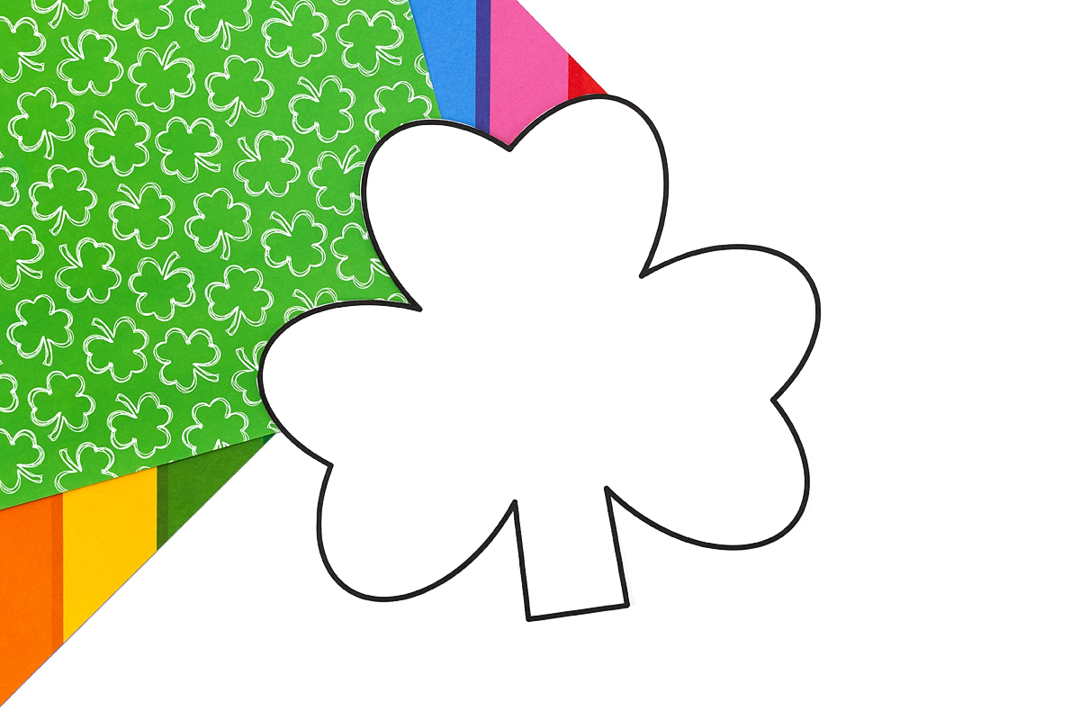 Shamrock template cut out along thick black outline.