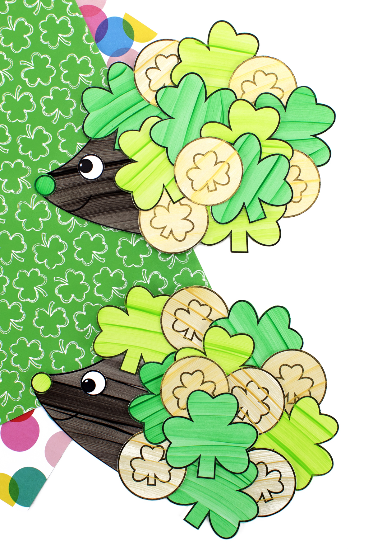 A paper hedgehog decorated with green shamrocks along its back.