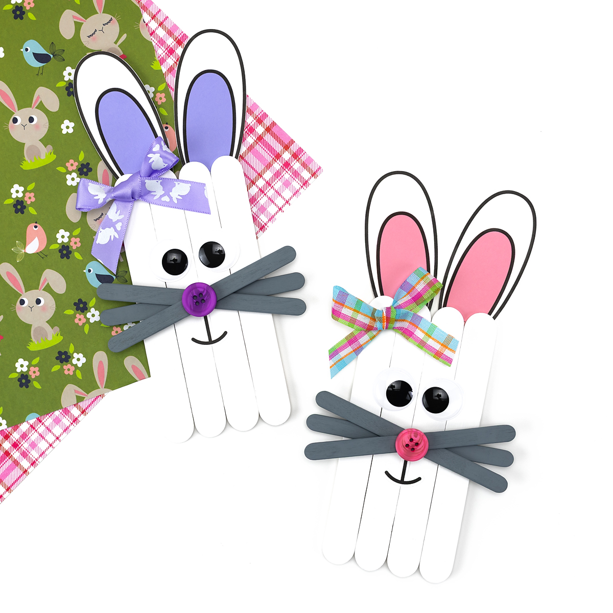 Finished popsicle stick bunny craft examples with different decorations and facial details.