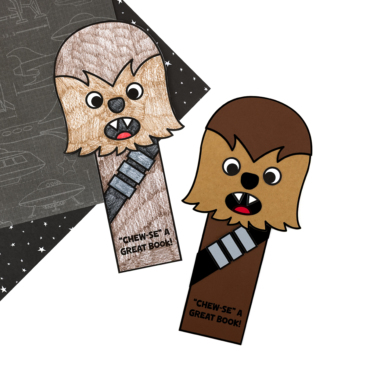 Finished Furry Space Friend bookmark craft for kids with “Chew-se a good book” text.