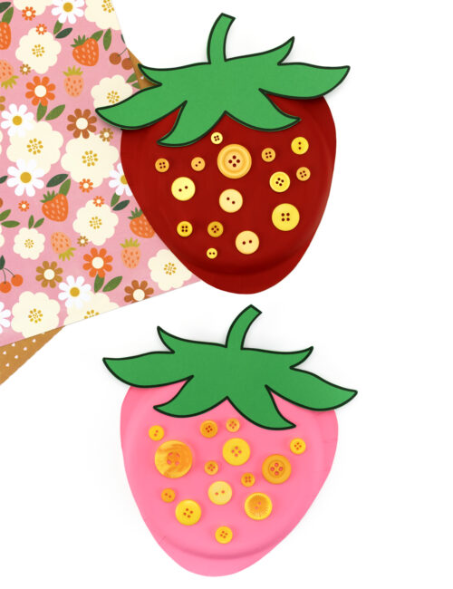 Red and pink paper plate strawberry crafts.