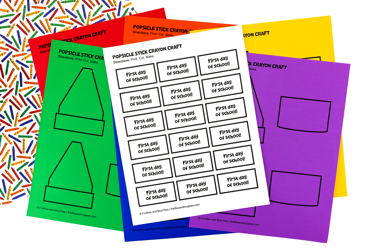 Free printable popsicle stick crayon craft templates fanned out in red, orange, green, blue, and purple, showing crayon tip shapes and "First Day of School" label sheets.