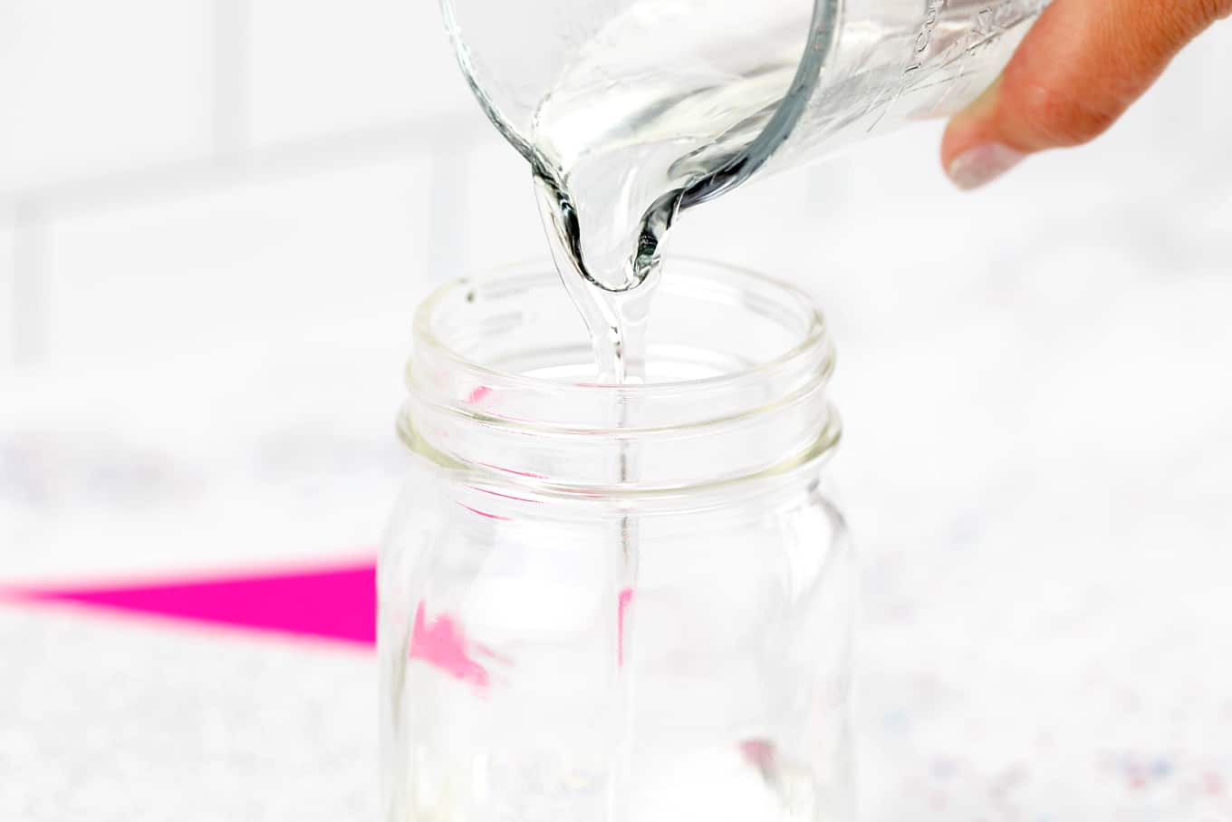 Pouring Clear Glue Into a Glitter Jar