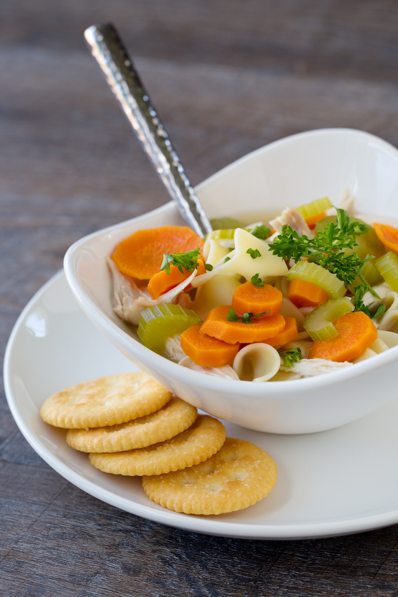 Chicken Noodle Soup This simple and comforting Homemade Chicken Noodle Soup is loaded with healthy vegetables, soft noodles, and tender shredded chicken. My family loves the classic flavor and I love that it can be made quickly.