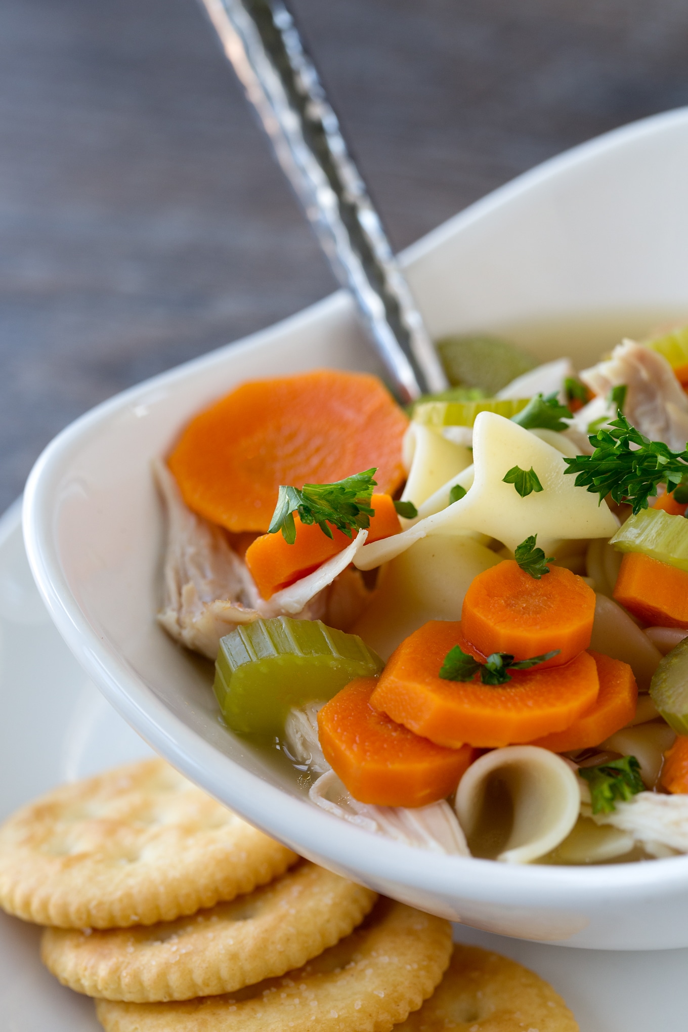 Chicken Noodle Soup This simple and comforting Homemade Chicken Noodle Soup is loaded with healthy vegetables, soft noodles, and tender shredded chicken. My family loves the classic flavor and I love that it can be made quickly.