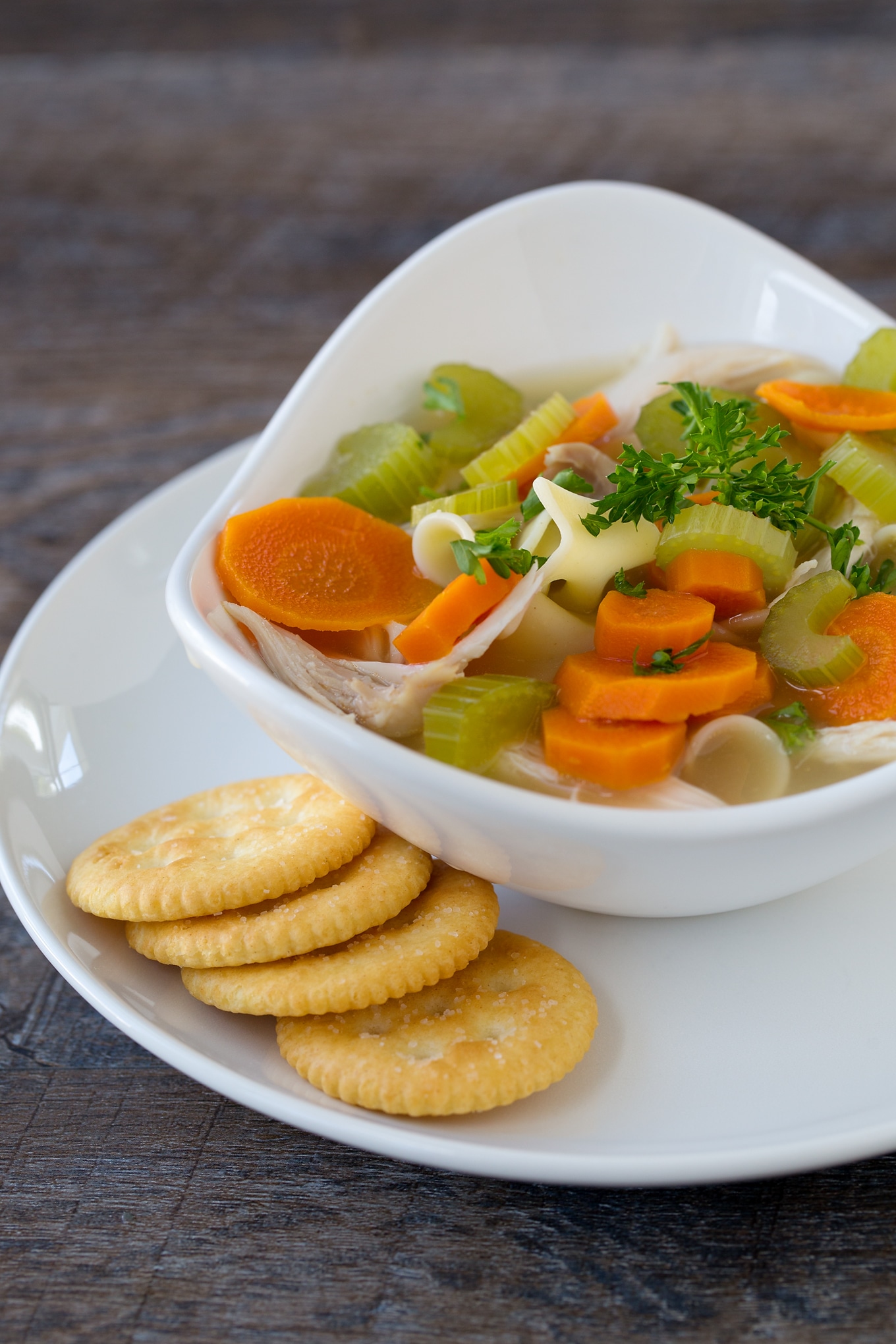 Chicken Noodle Soup This simple and comforting Homemade Chicken Noodle Soup is loaded with healthy vegetables, soft noodles, and tender shredded chicken. My family loves the classic flavor and I love that it can be made quickly.