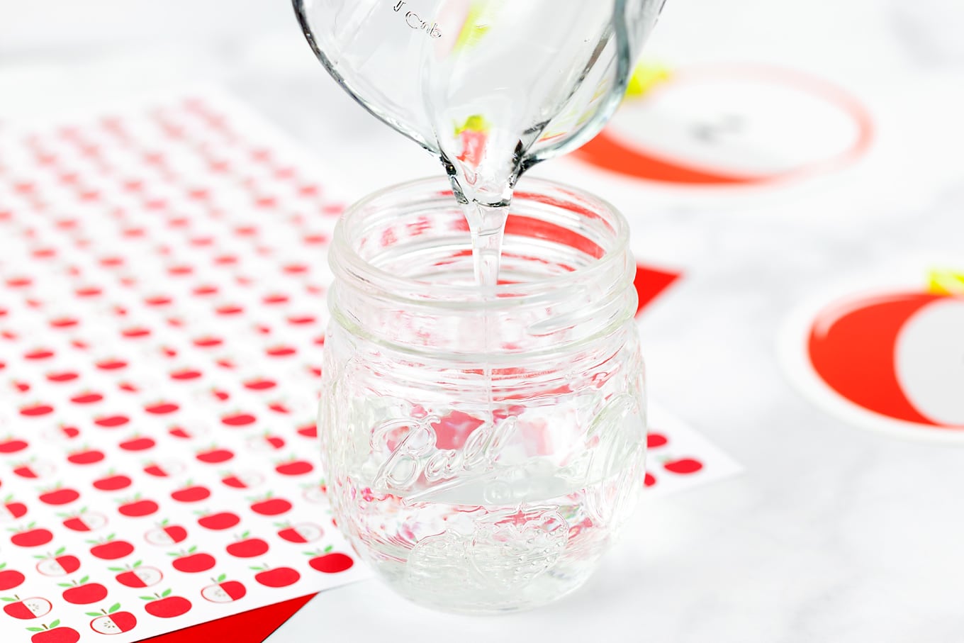 Clear Glue Being Added to Glitter Jar Clear Glue Being Added to Glitter Jar