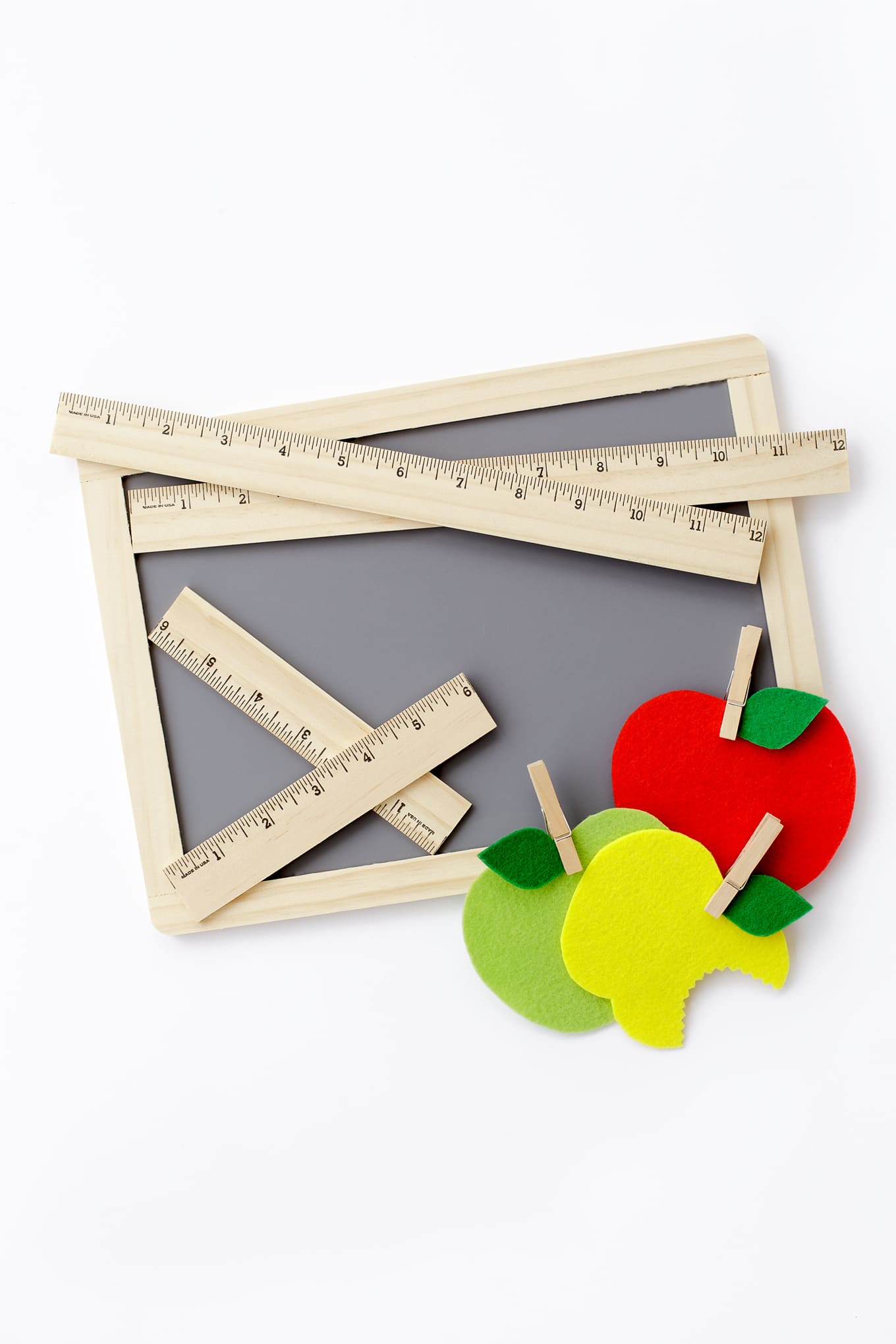 Learn how to make an easy DIY First Day of School Sign. It's the perfect back to school photo prop for kids!