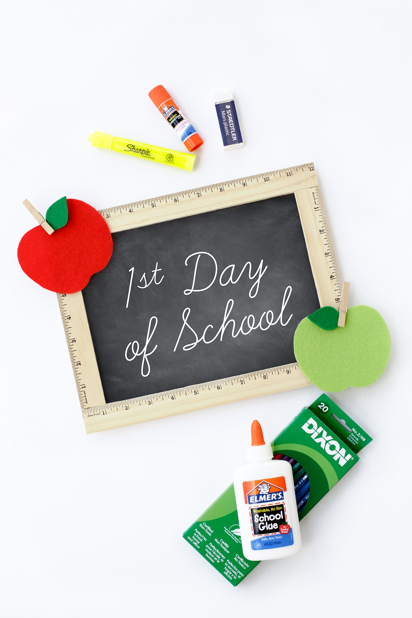 Learn how to make an easy DIY First Day of School Sign. It's the perfect back to school photo prop for kids!