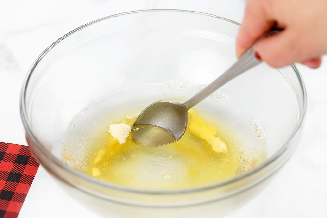 Stirring Gelatin and Water to Make Birdseed Feeders