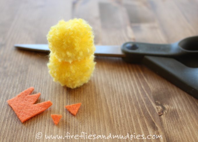 Simple Pom Pom Baby Chicks – Learn how to make pom pom pets for Easter. These adorable baby chicks are the perfect Easter basket addition and can be made with simple craft supplies.