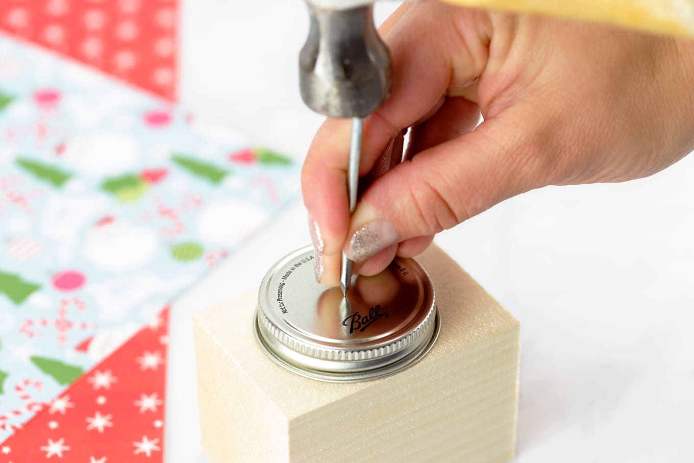 Hammer a Hole in a Mason Jar Lid