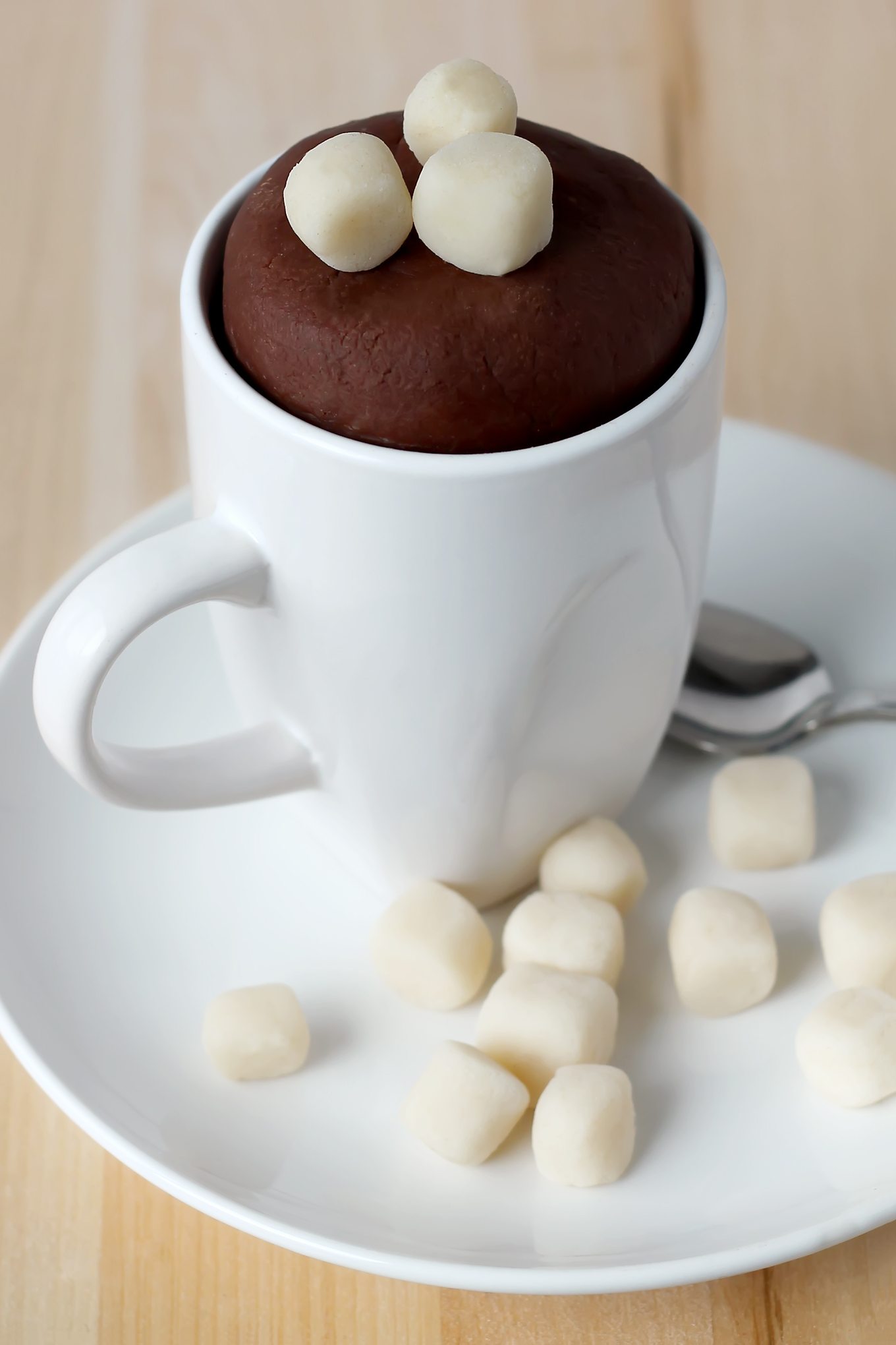 Hot Chocolate Playdough is easy to make! It smells like real chocolate and is fun winter sensory play for kids. #winterplaydoughrecipes #hotchocolateplaydough #chocolateplaydough #sensoryplay #playdoughactivities How to Make Hot Chocolate Playdough