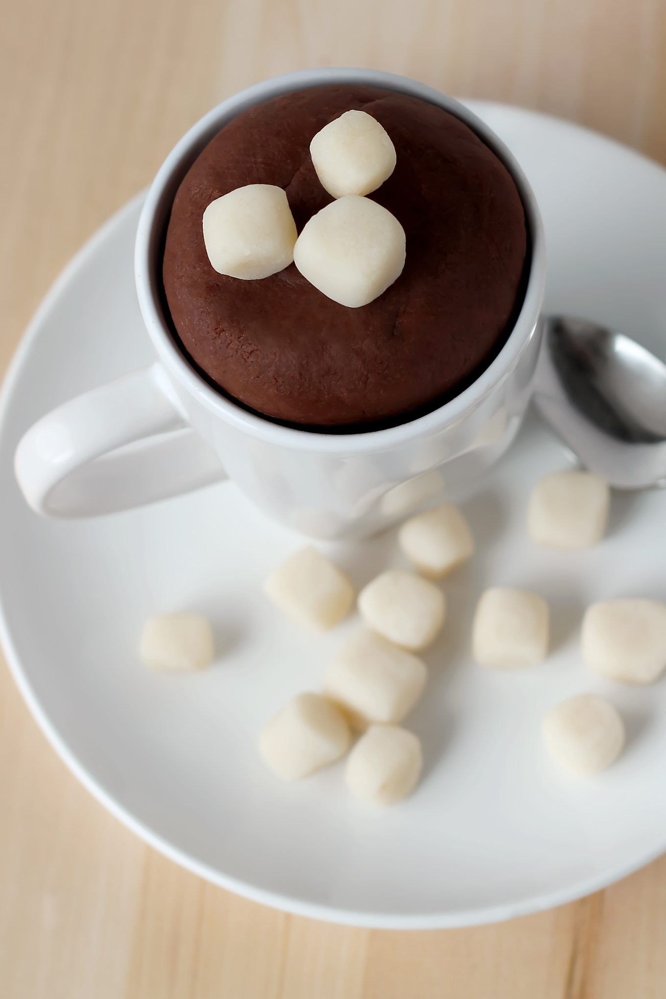 Hot Chocolate Playdough is easy to make! It smells like real chocolate and is fun winter sensory play for kids. #winterplaydoughrecipes #hotchocolateplaydough #chocolateplaydough #sensoryplay #playdoughactivities Hot to Make Hot Chocolate Playdough