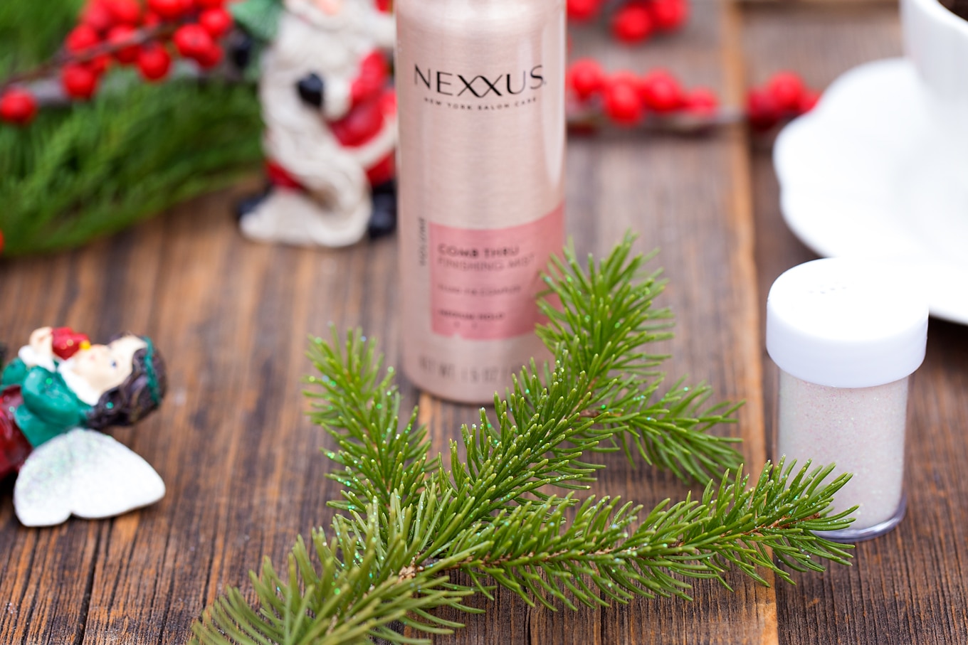 Just in time for Christmas, learn how to make a festive Christmas Teacup Garden with pine sprigs, winterberry, a teacup and saucer, and Christmas miniatures. #diychristmasgift #christmascrafts #teacupgarden #fairygardencrafts #christmasteacupgarden Christmas Teacup Garden In-Process