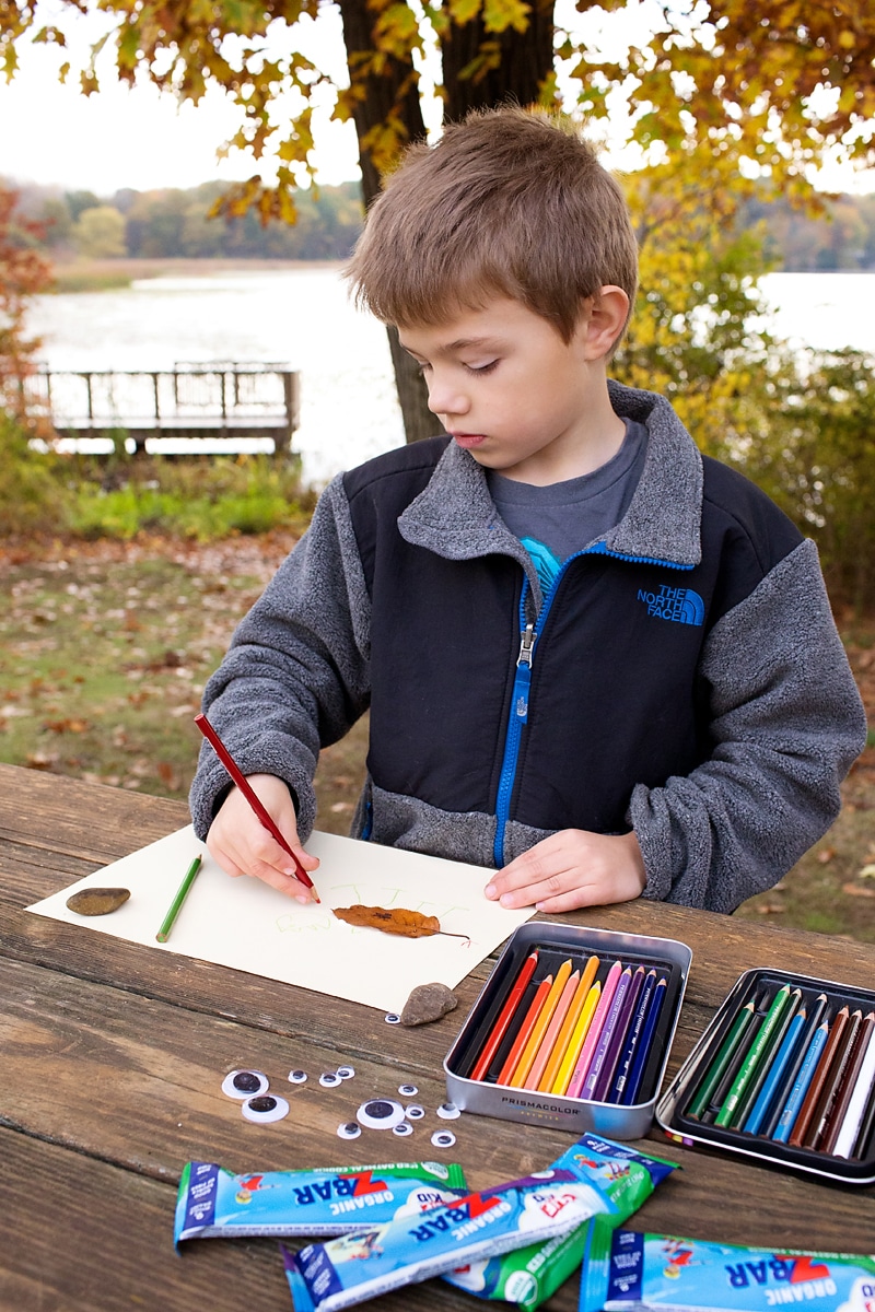 Kids of all ages will enjoy using leaves, twigs, pebbles, and pine cone to make creative nature art! It's the perfect fall nature craft for kids.
