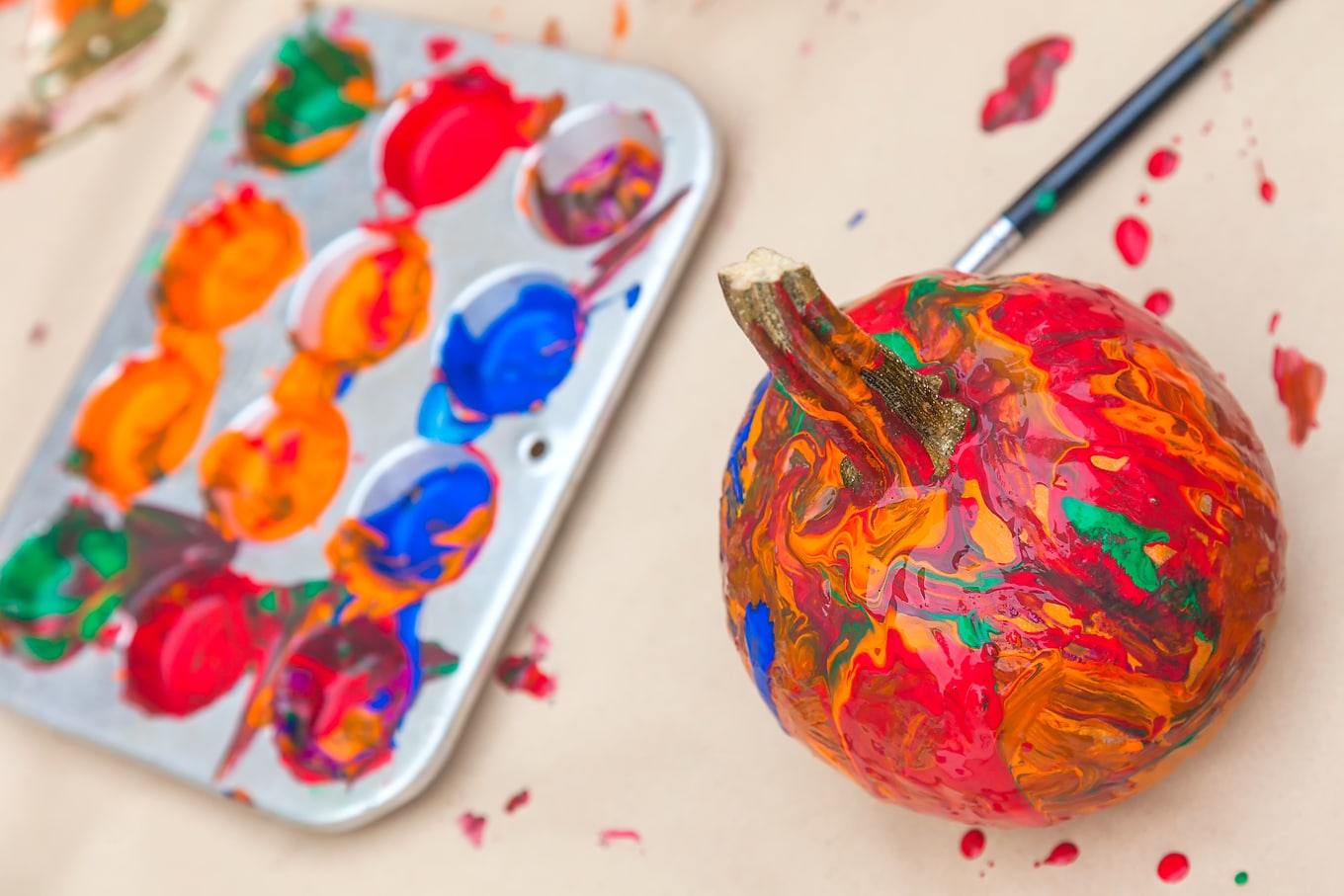 If you're on a quest to make the most of this season with your family in budget-friendly ways, here is a list of 10 Ways to Enjoy Simple Fall Family Fun! #family #parenting #fall #fallactivities #fallfun #kids Painting Pumpkins for Simple Fall Fun
