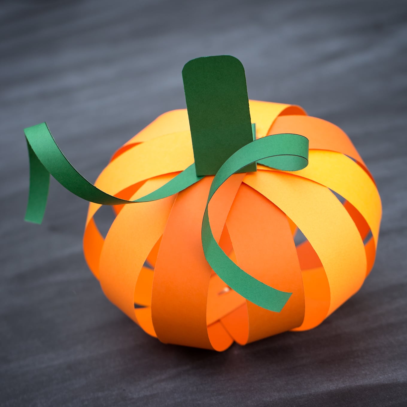 Paper Strip Pumpkin Craft Kids love this easy paper strip pumpkin craft! This simple fall craft includes a free printable template, making it perfect for home or school.