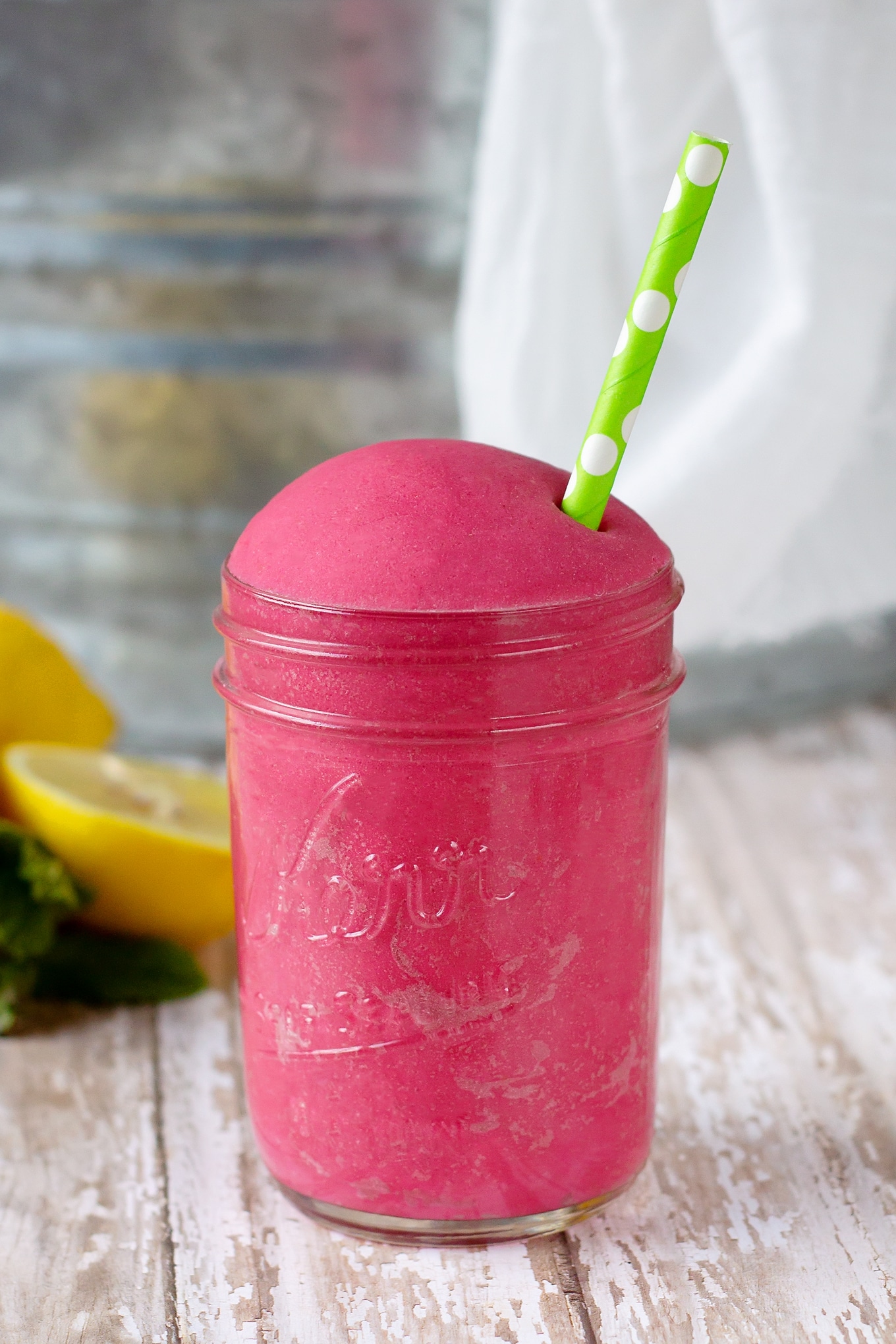 This pink lemonade playdough is soft, vibrant, and smells just like lemonade! It's perfect for summer sensory play. #summerplaydough #pinklemonadeplaydough #pinklemonade #preschoolactivities #playdoughrecipes