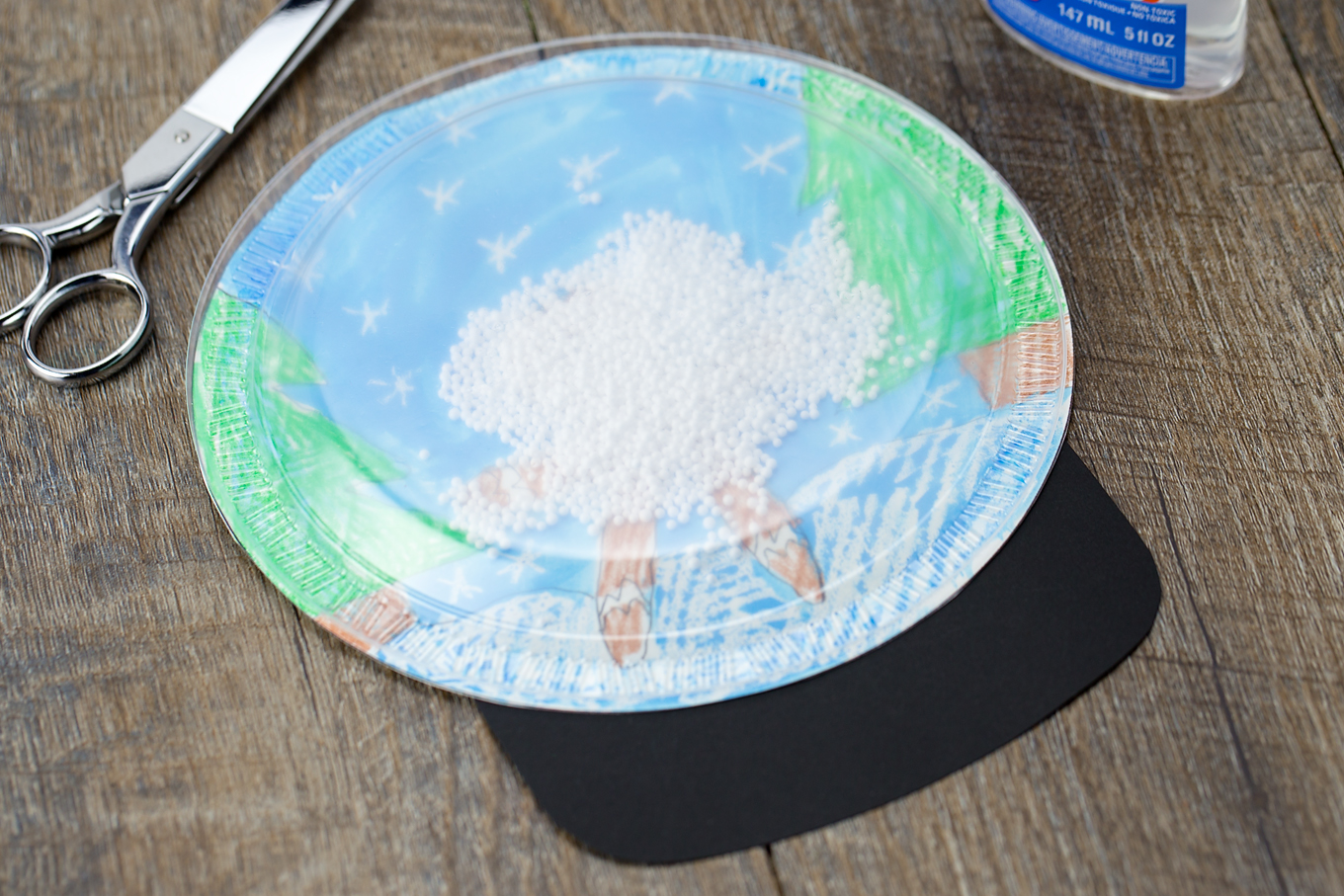 How to Make a Plastic Plate Snow Globe Craft How to Make a Plastic Plate Snow Globe Craft