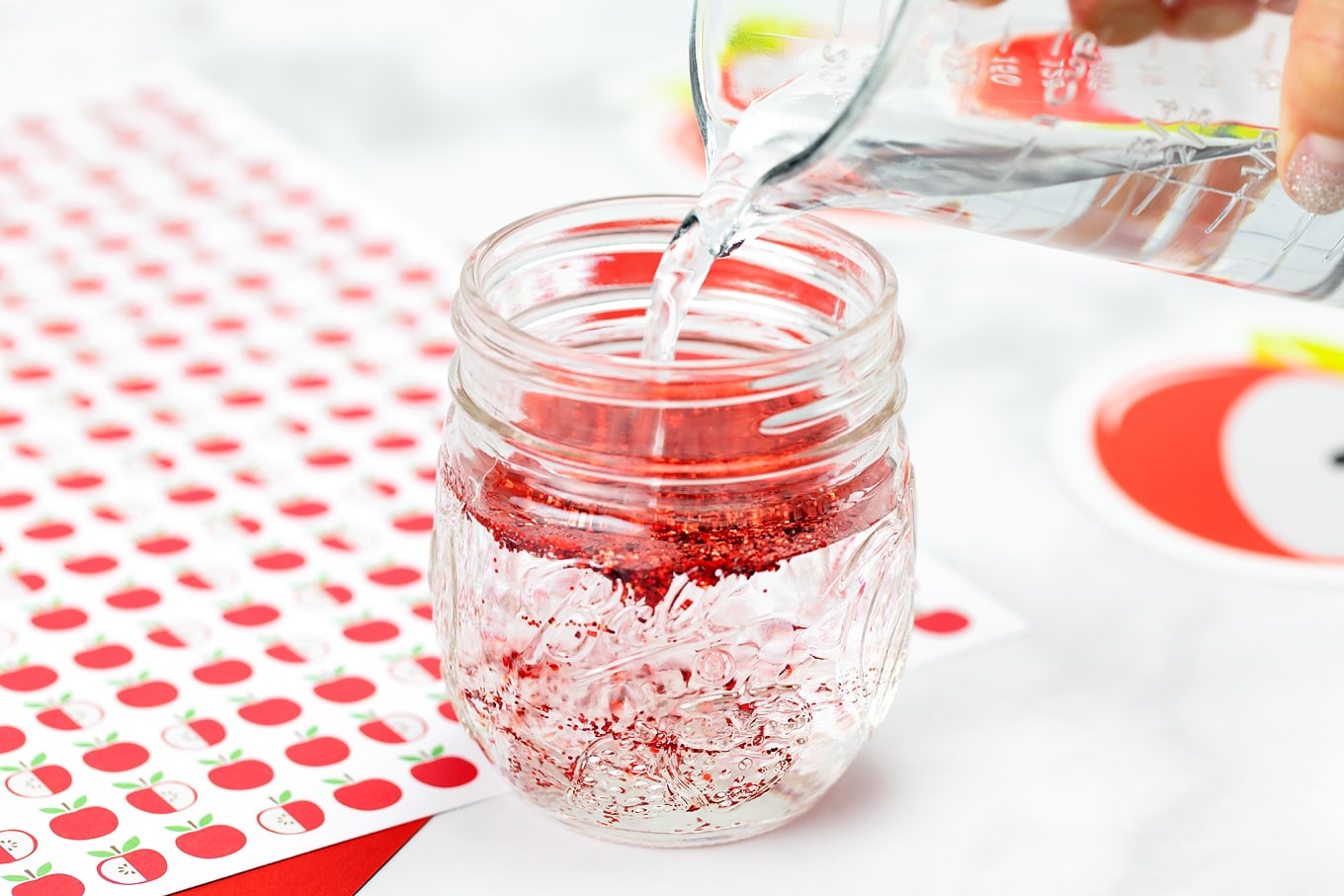 Pouring Water Into Glitter Jar Pouring Water Into Glitter Jar