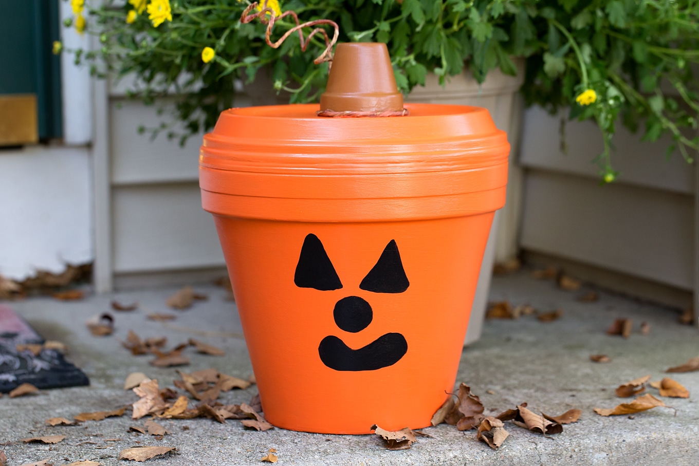 Terracotta Pot Jack O'Lantern Craft Bring a little Halloween fun to your garden, patio, or porch with this easy Terracotta Pot Jack O'Lantern Craft. It's a fun Halloween craft for kids!