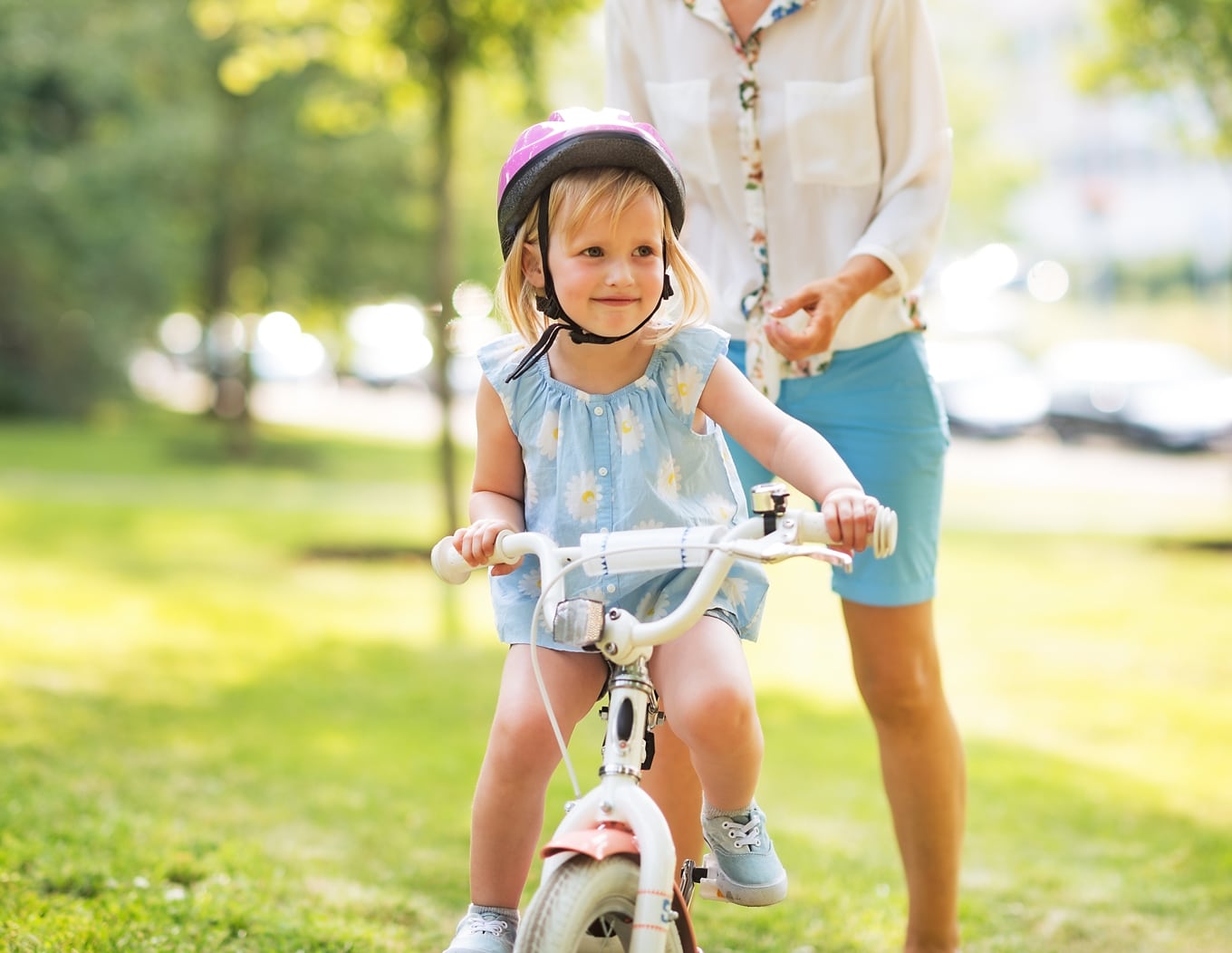 kid learning to ride a bike