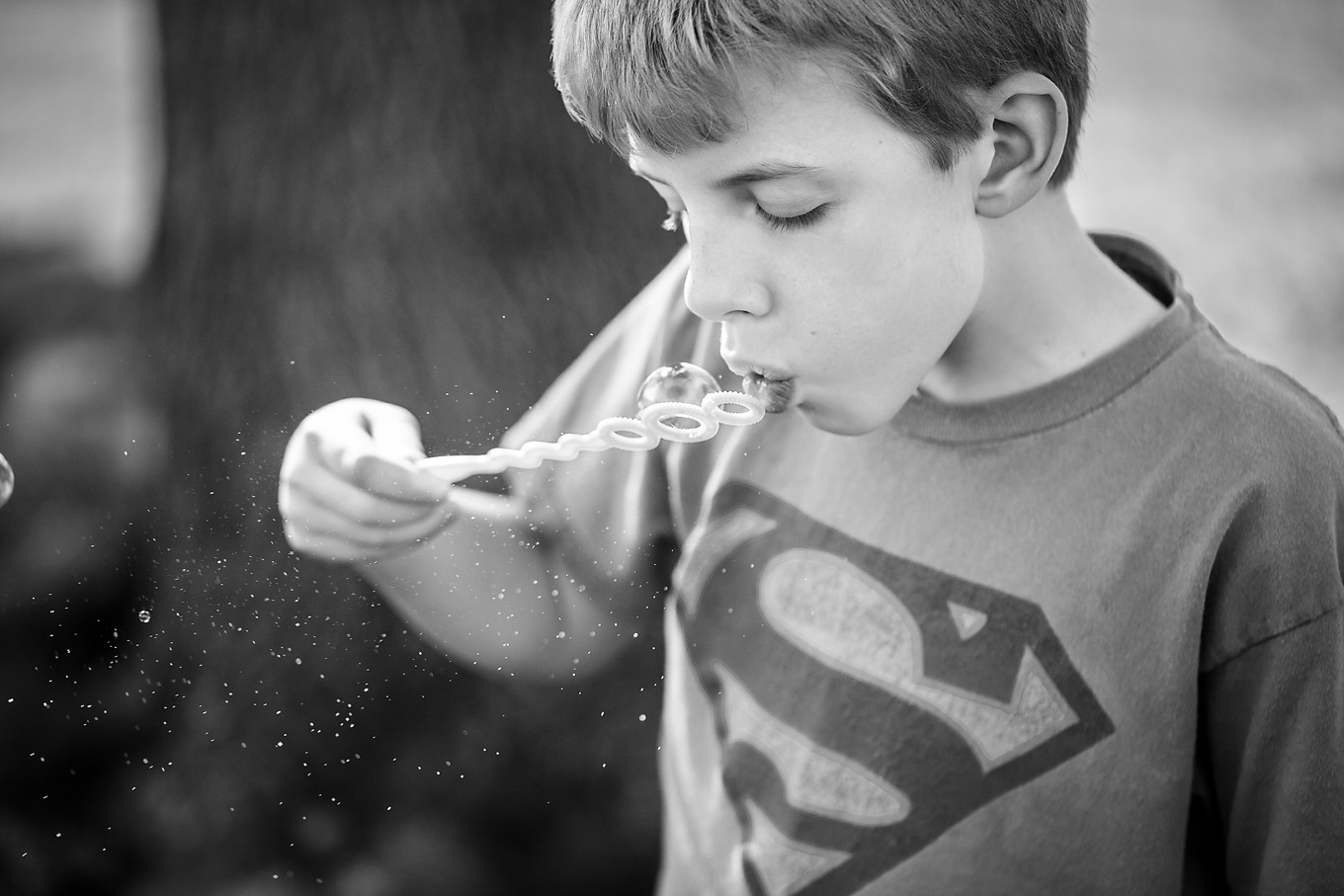 Child Blowing Bubbles Child Blowing Bubbles