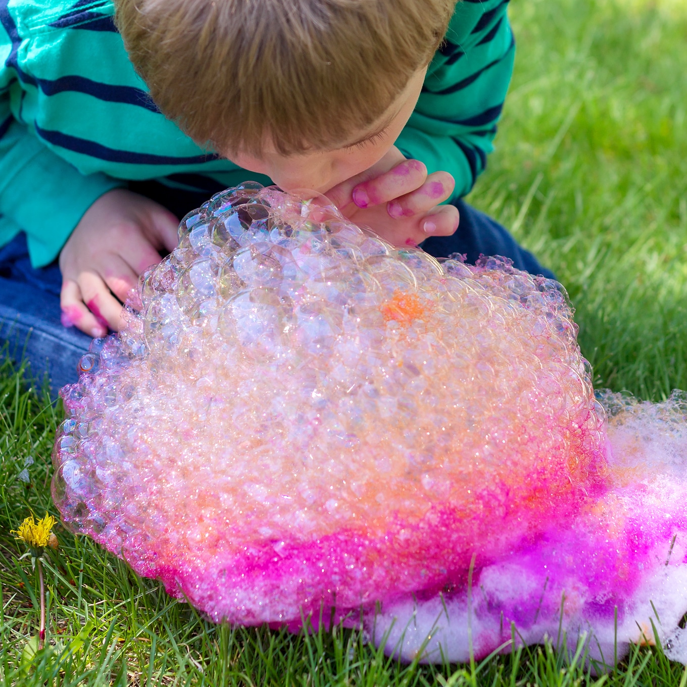 Child Blowing Bubbles for Bubble Painting Child Blowing Bubbles for Bubble Painting