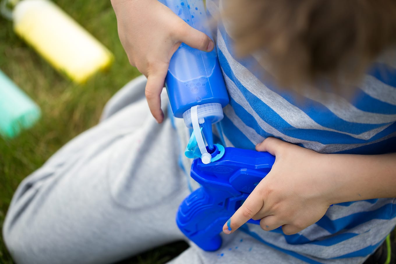 Boy Preparing Squirt Gun Tie-Dye