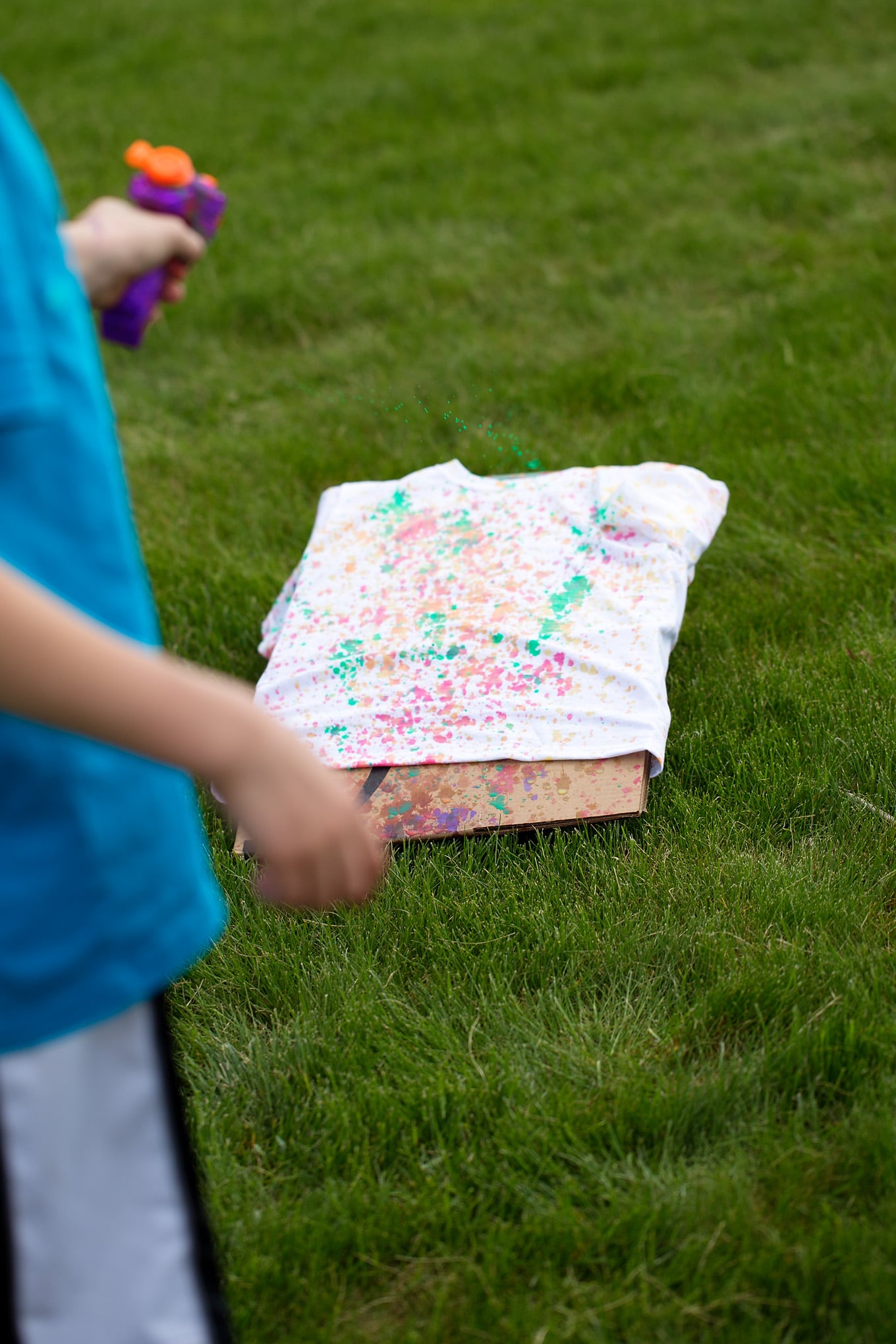Boy Enjoying Squirt Gun Tie-Dye