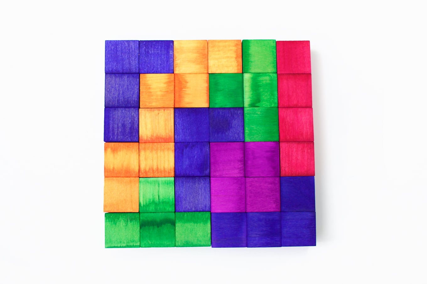 Children of the 80's, get ready to swoon! This vibrant Tetris Inspired Puzzle forms a perfect square when solved! It has more than one solution, and the pieces can also be used as blocks. Tetris Inspired Puzzle