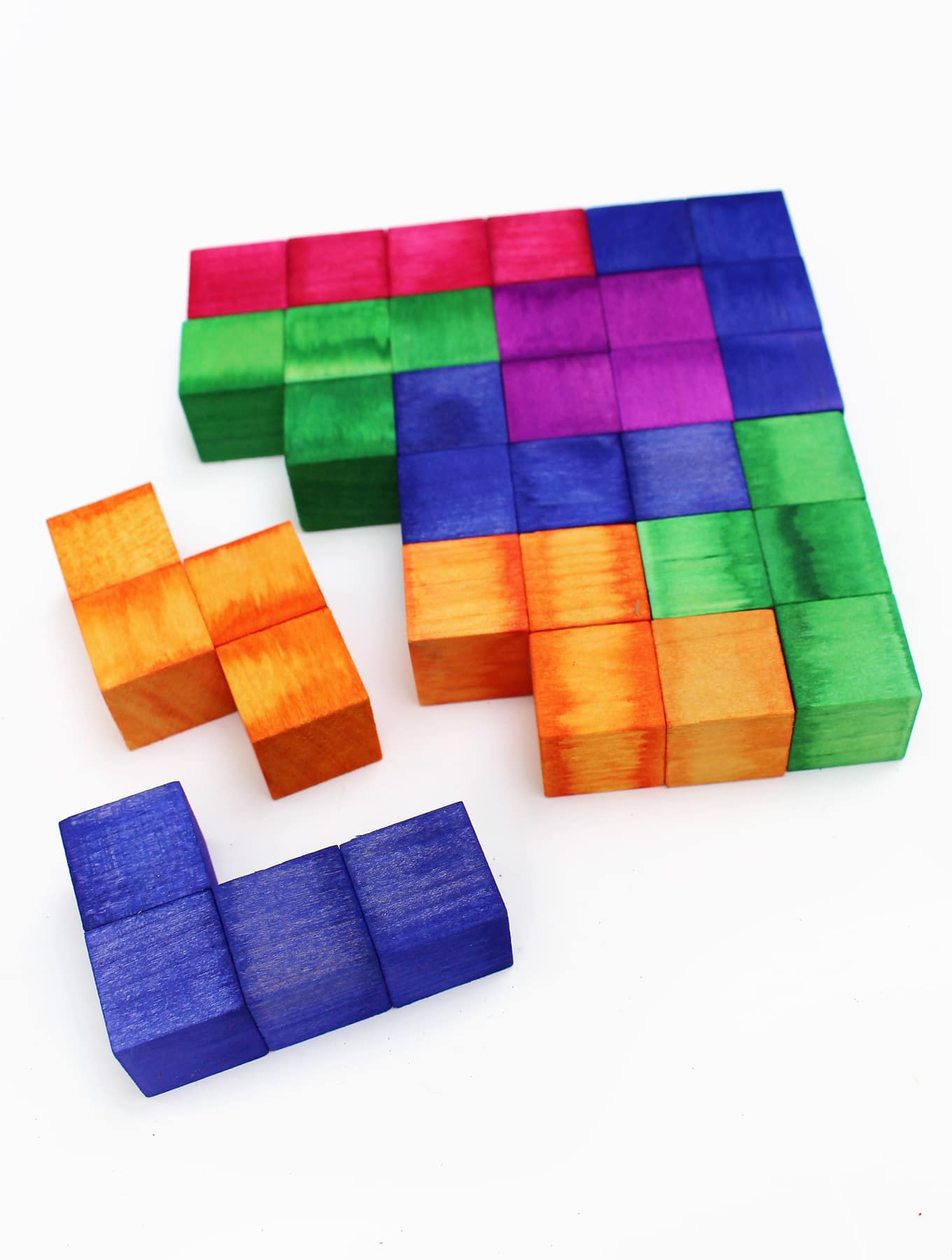 Children of the 80's, get ready to swoon! This vibrant Tetris Inspired Puzzle forms a perfect square when solved! It has more than one solution, and the pieces can also be used as blocks. Tetris Inspired Puzzle