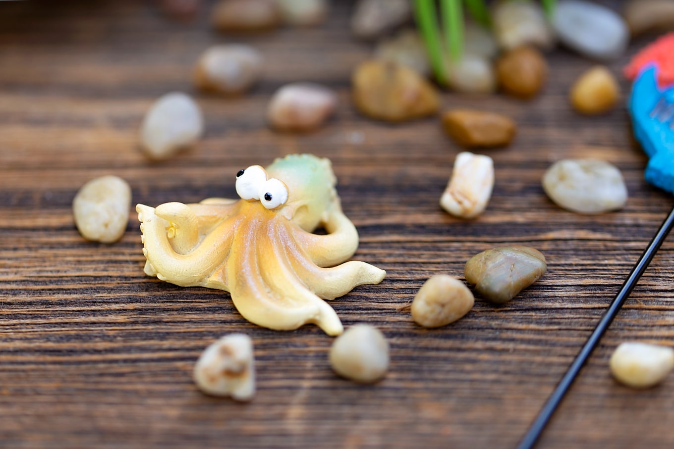 Summer is the perfect season for teacup fairy gardens! Whether kids are learning about the ocean, summer, gardening, or simply enjoying a creative nature activity at home, this easy and fun Under the Sea Teacup Garden is simply perfect for imaginative play. #teacupfairygarden #teacupfairygardenideas #howtomakeateacupfairygarden #summercraftideas #fairygarden #fairygardening #fairygardenkids Resin Octopus for Under the Sea Teacup Garden