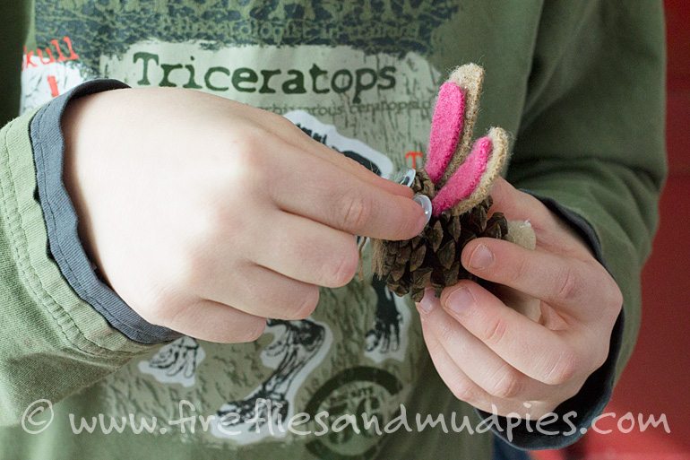 Putting Googly Eyes on Pine Cone Bunnies | Fireflies and Mud Pies